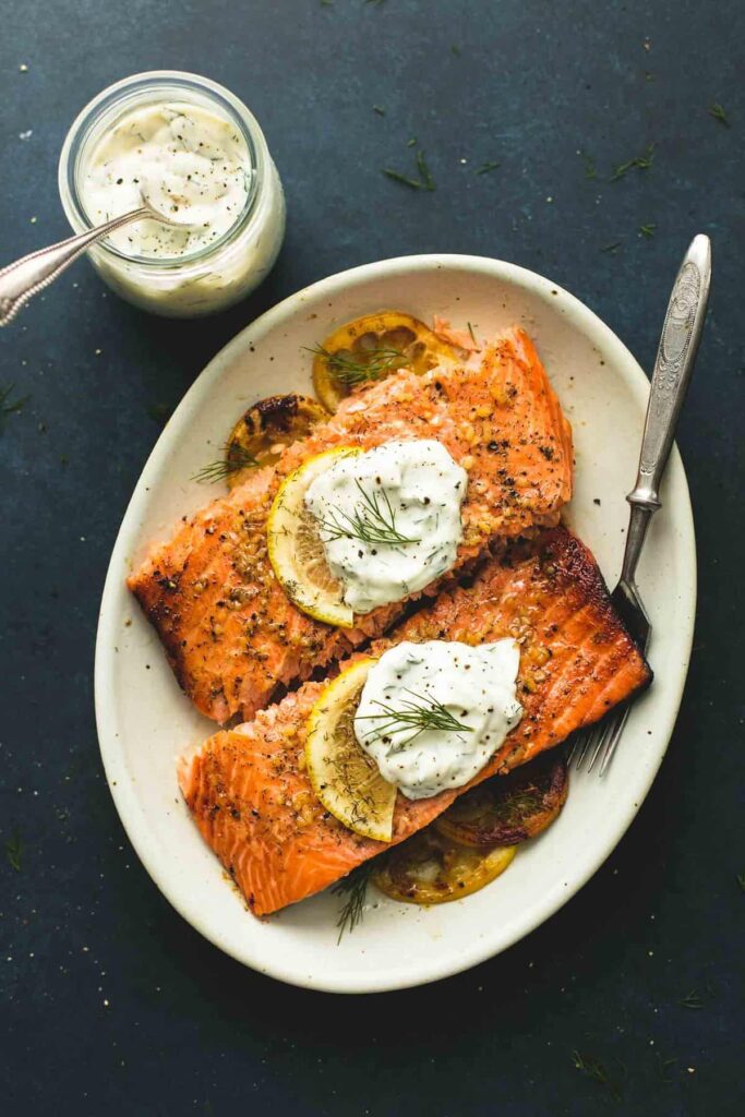 Salmon fillets with dill and lemon sauce.