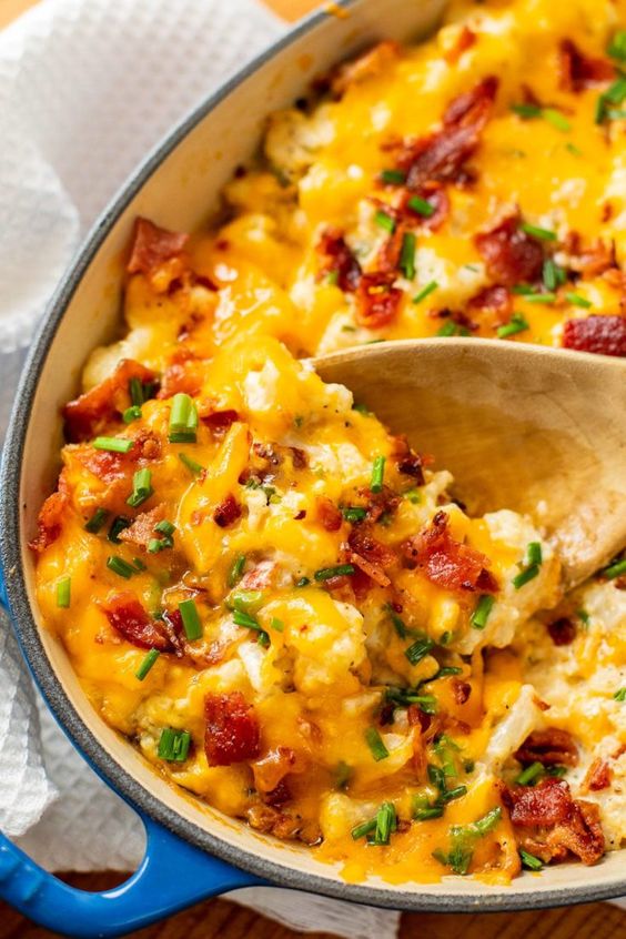 Baked cauliflower with eggs, onion and bacon.