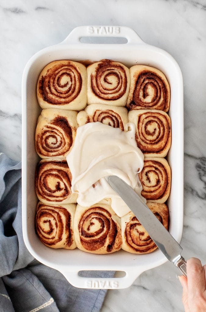 Sweet rolled pastry with cinnamon and glaze.