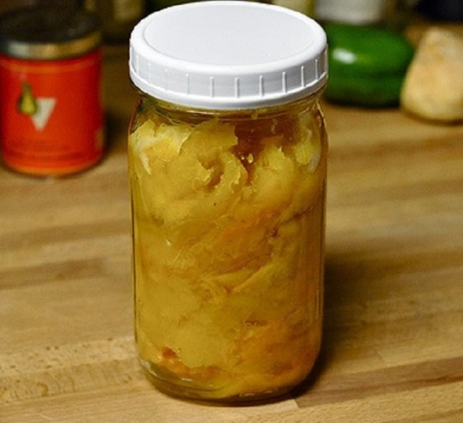 Pickled pumpkin in a mason jar.