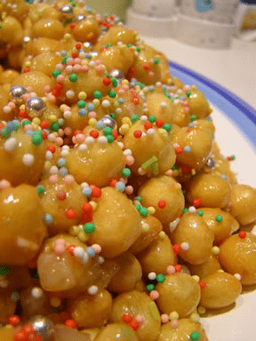 Honey struffoli, decorated with colored balls.