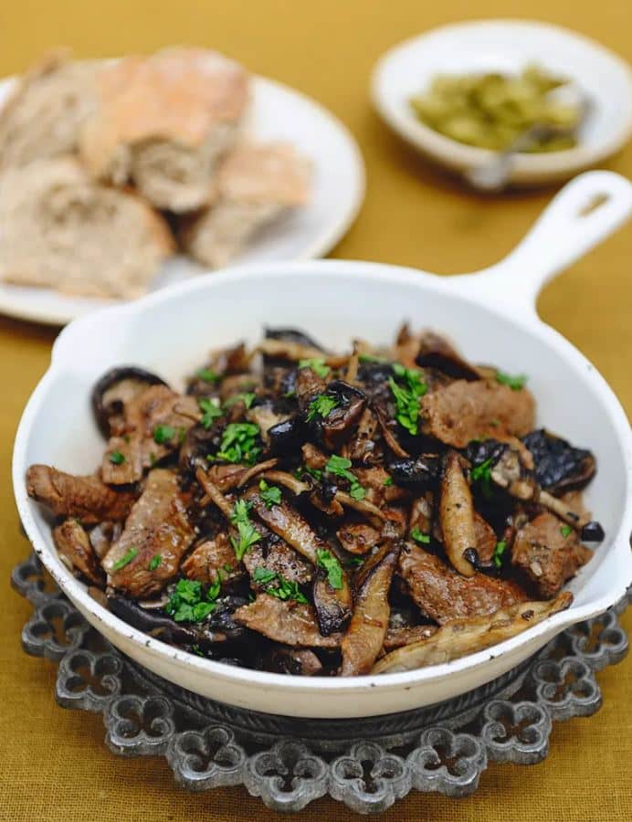 Meat noodles with mushrooms deglazed with brandy
