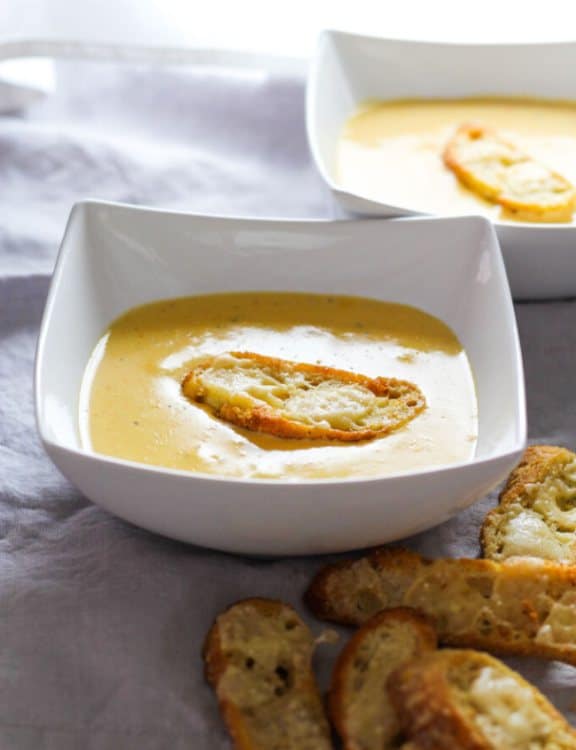 Soup made from melted cheese served with a toasted piece of pastry