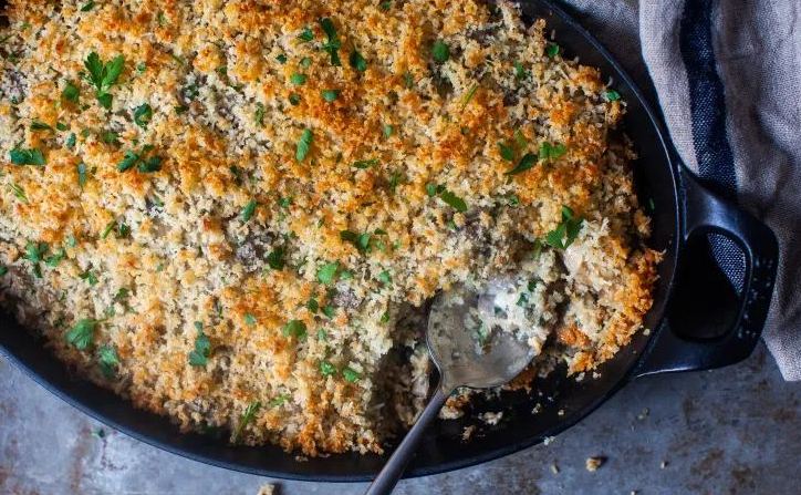 A mixture of mushrooms baked with parmesan and breadcrumbs