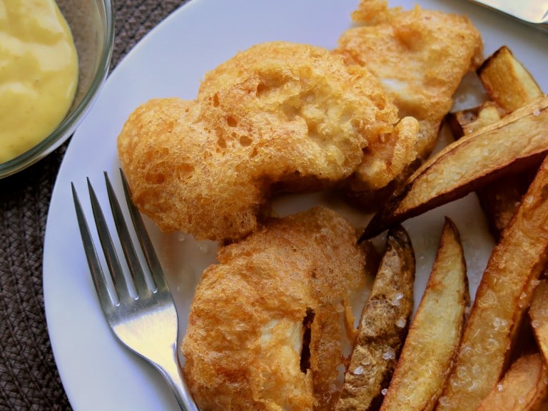 Medallions of turkey meat coated in beer batter served with fries