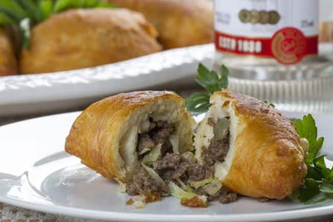 Pies filled with a mixture of meat and cabbage