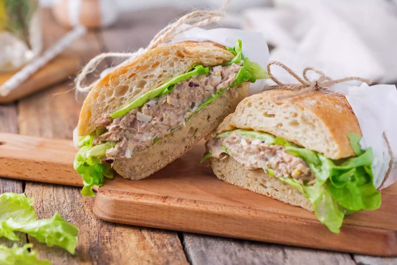 Baguettes with salad spread with tuna and egg mixture