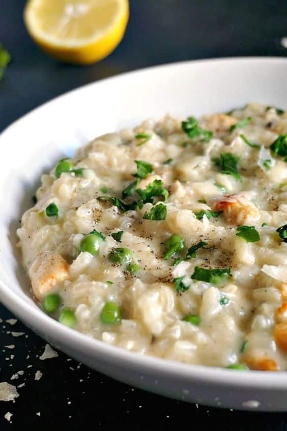Creamy risotto with peas, sprinkled with coriander.