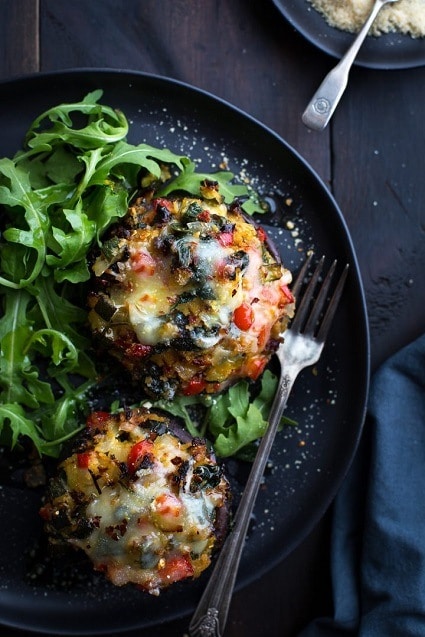 Portobello mushrooms, stuffed with vegetables and baked with cheese.