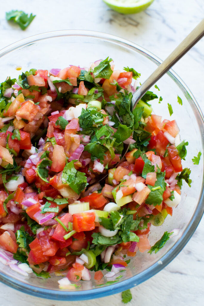 Homemade tomato salsa with parsley.