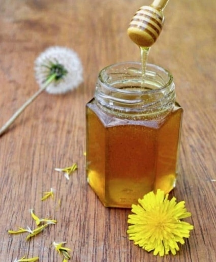 Dandelion honey in a jar.