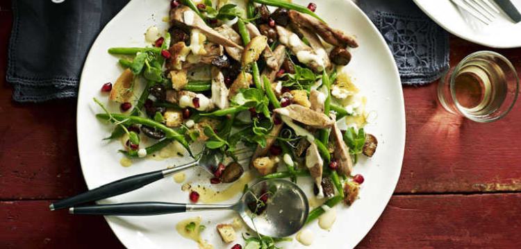 Salad with pheasant meat, green beans, chestnuts, pomegranate and croutons