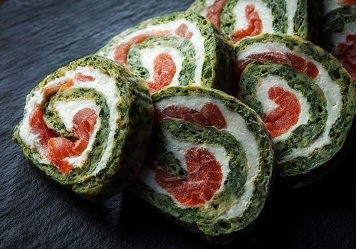 Spinach roll, filled with mozzarella and smoked salmon.