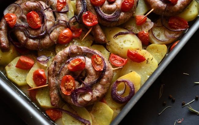 A dish made from baked sausage and vegetables