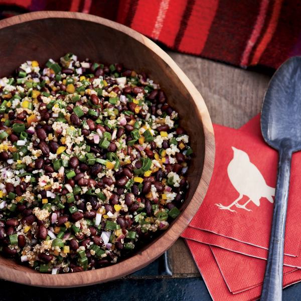 A bowl of quinoa, bean, pepper and onion salad