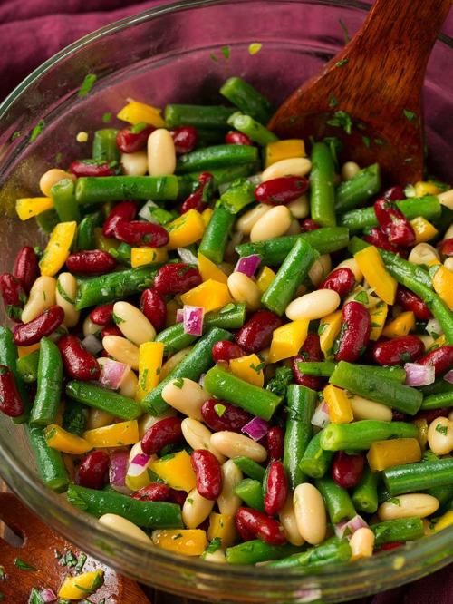 A dish made from a mixture of white, red and green beans