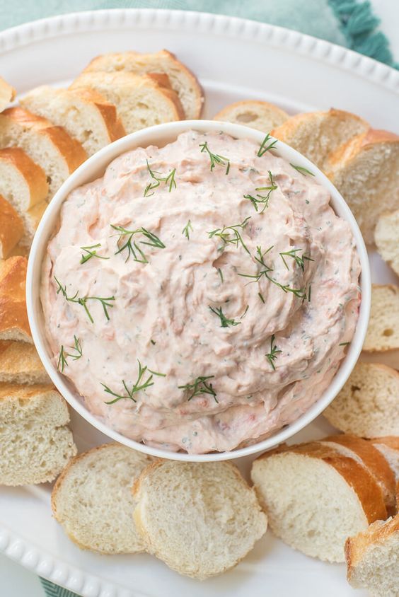 Cover with ala salmon spread, sprinkled with dill.