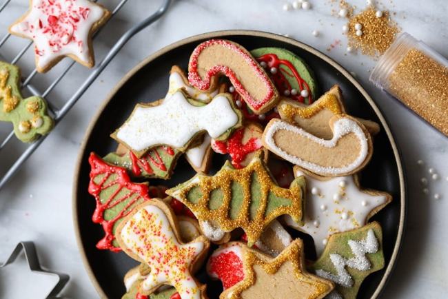 Richly decorated, colorful Christmas pastries made of almonds and coconut