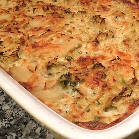 Potatoes from the oven with cabbage in a baking dish.