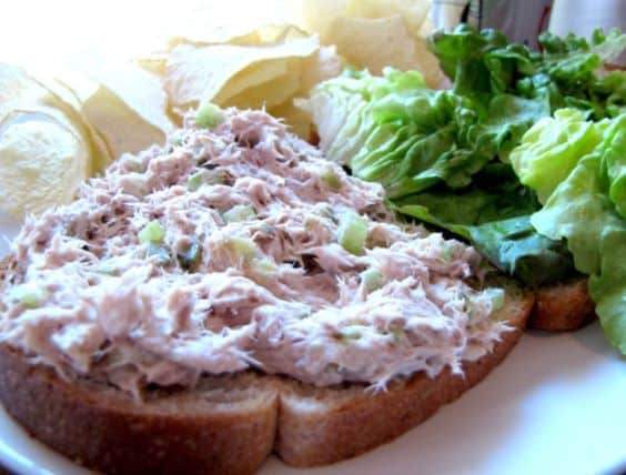 Bread with fish spread and salad.
