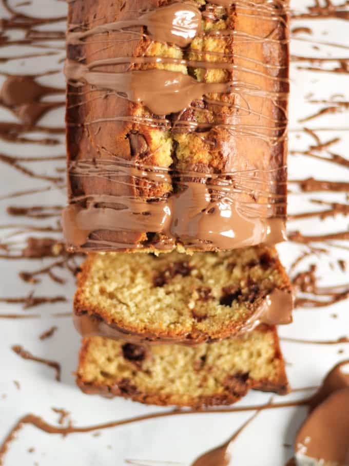 A quick dessert made of bananas with chocolate frosting.