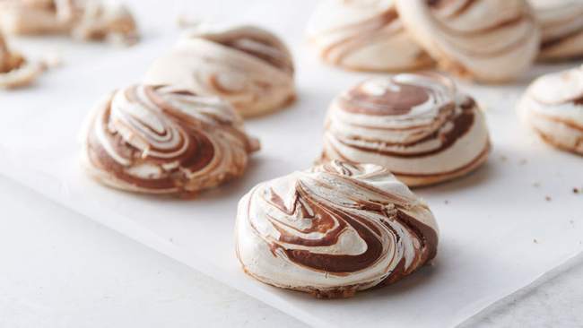 Christmas pastry from whipped egg whites with chocolate.