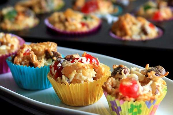 Christmas cupcakes with candied fruit and nuts.