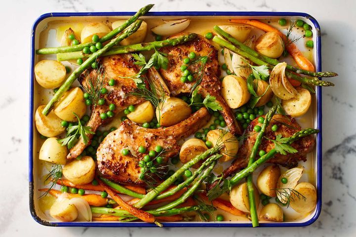 Pork with mustard and vegetables in garlic butter.