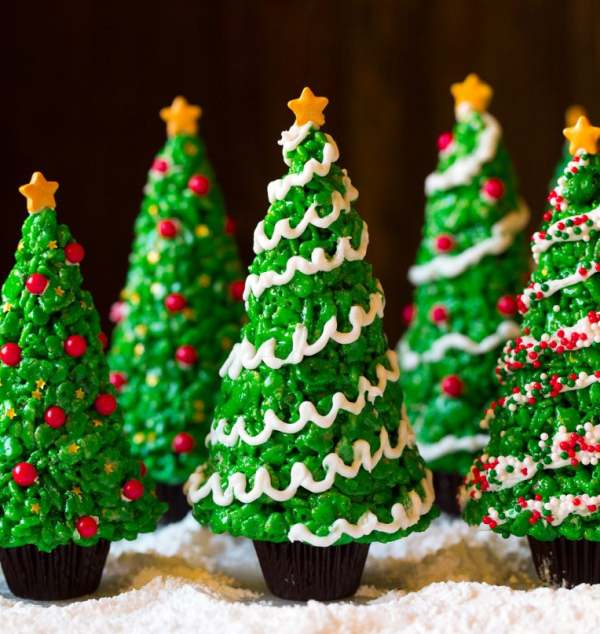 Christmas cookies in the shape of trees created from burisons.