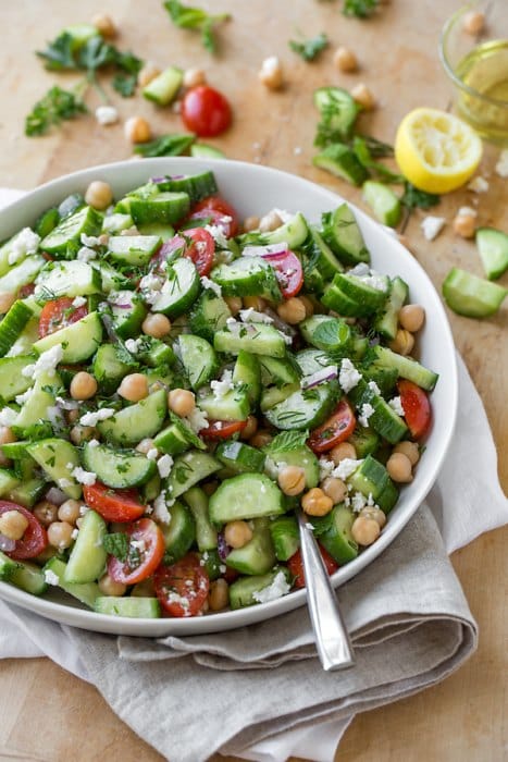 A dish made from a mixture of cucumbers, tomatoes, chickpeas and feta cheese.