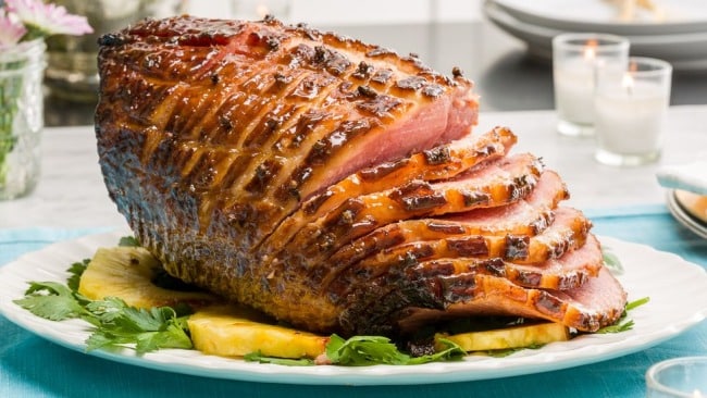 Festive ham with apples and mustard.