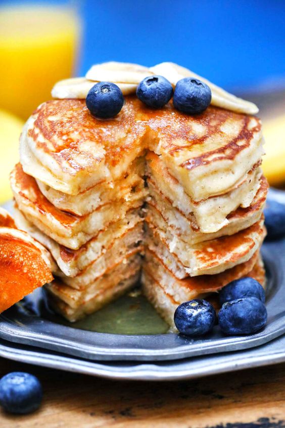 Pancake tower with banana and blueberries.
