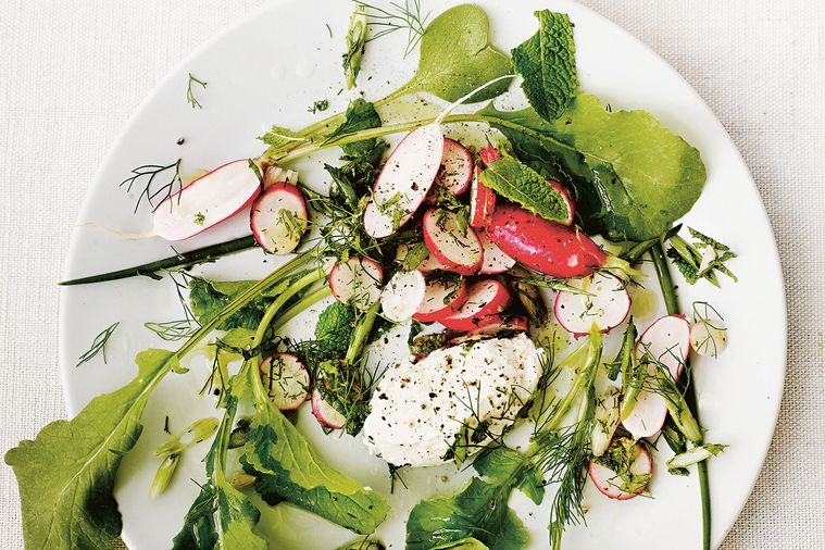 Radish and cottage cheese salad served on a plate.