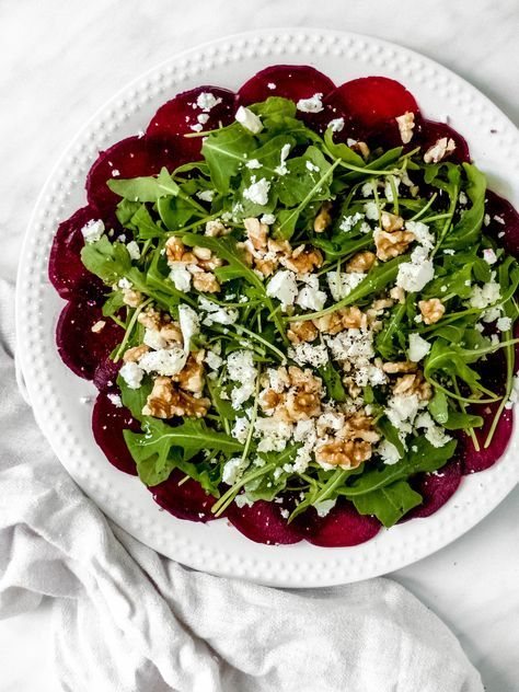Beetroot as an Italian appetizer with cheese, nuts and arugula.
