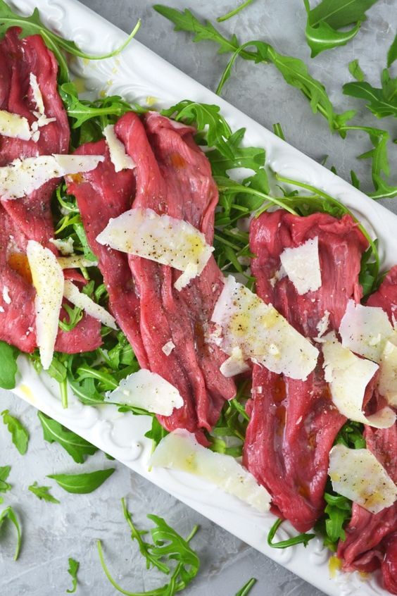 Delicious raw beef with parmesan and oil.
