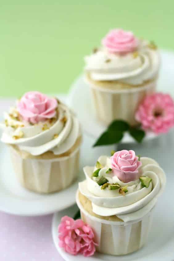 Pistachio cupcakes with rose water and marzipan rose.