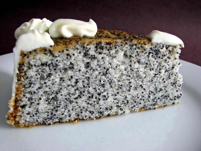 A piece of poppy seed cake, spread with a little mascarpone cream.