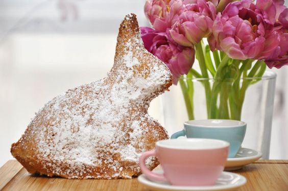 Baked Easter bunny with nuts and powdered sugar.