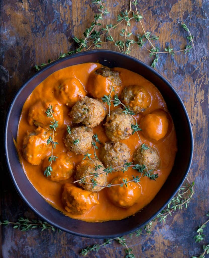 Roasted turkey meatballs with paprika sauce served in a large bowl.