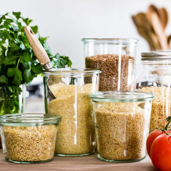 Jars with different types of bulgur.