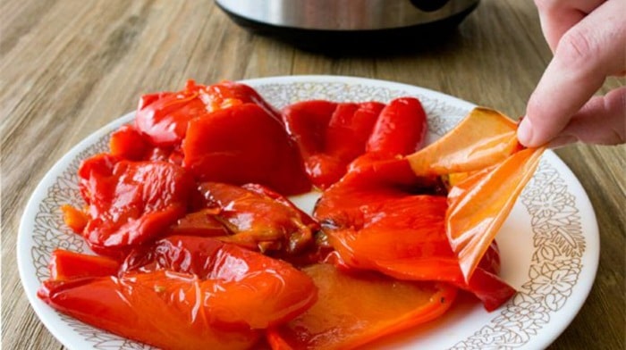 A plate of roasted peppers that are easy to peel.