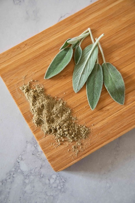 Fresh sage and its ground dried form.