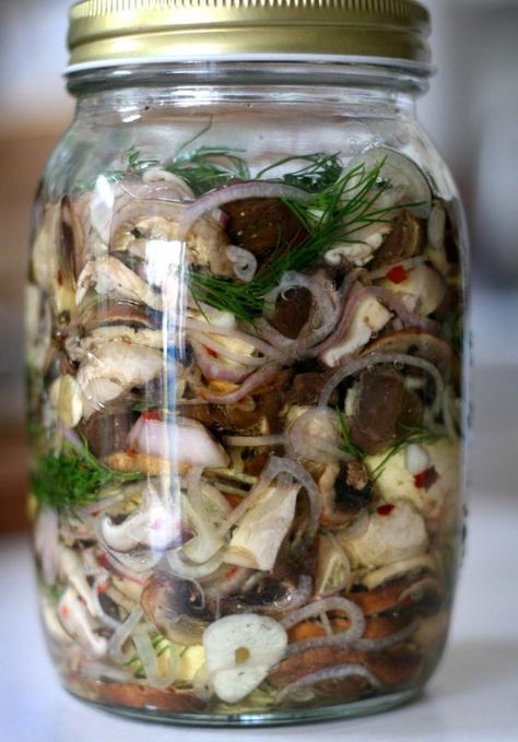 Chopped mushrooms pickled in a lacquer with vegetables and herbs.