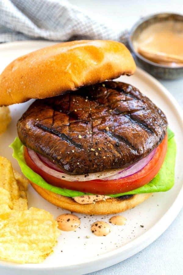 Vegetarian burger with mushroom steak.