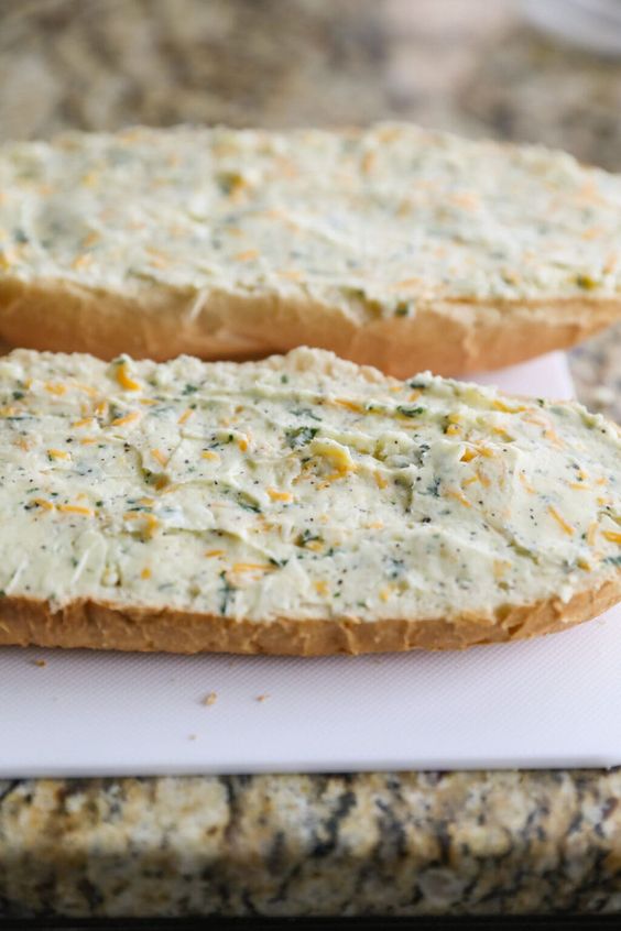 Bread spread with a delicious and creamy garlic cheese spread.
