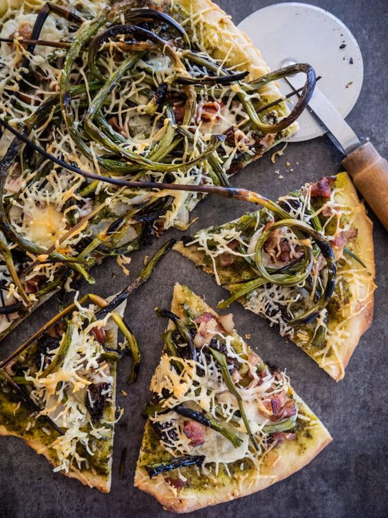 Pizza with cheese, asparagus and morel.