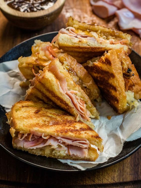 Baked toast bread with ham and melted cheese.