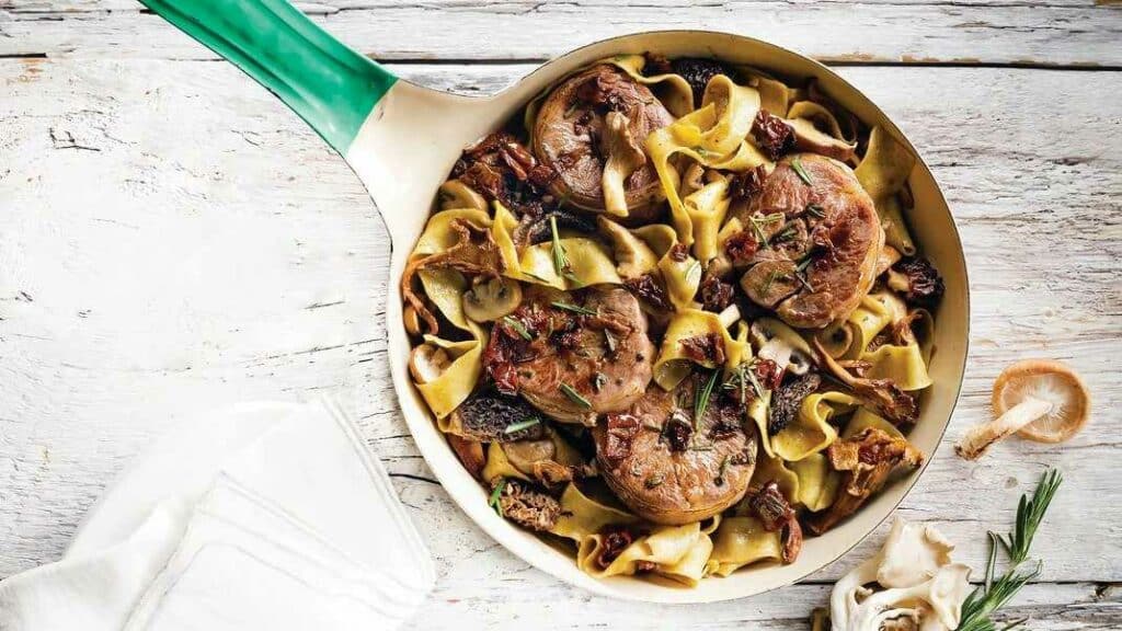 Lamb and mushrooms braised with red wine, garlic and beef broth, all served with pan-seared pasta.