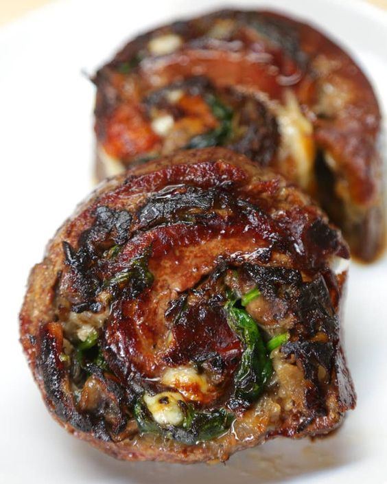baked crispy meat roll with spinach.