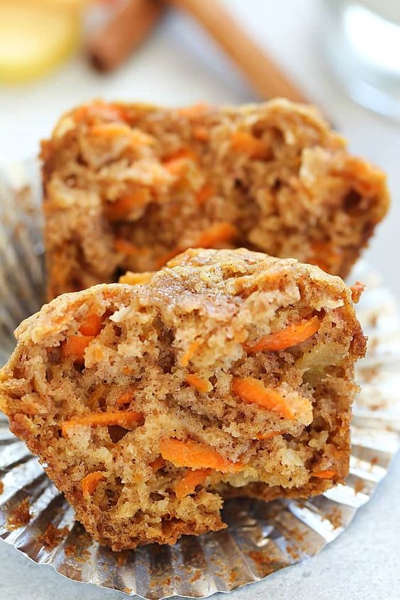 Soft carrot muffin with pieces of apples.